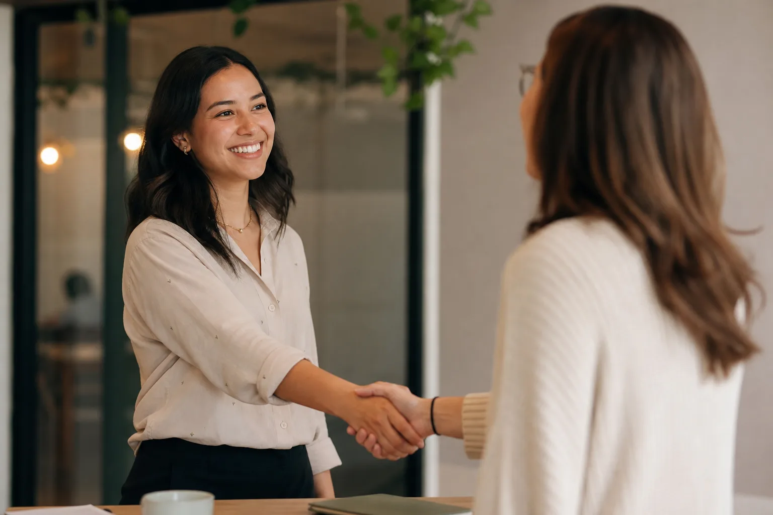 two people shaking hands